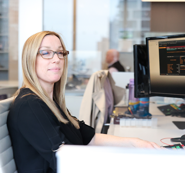 Anne Dudginski at computer