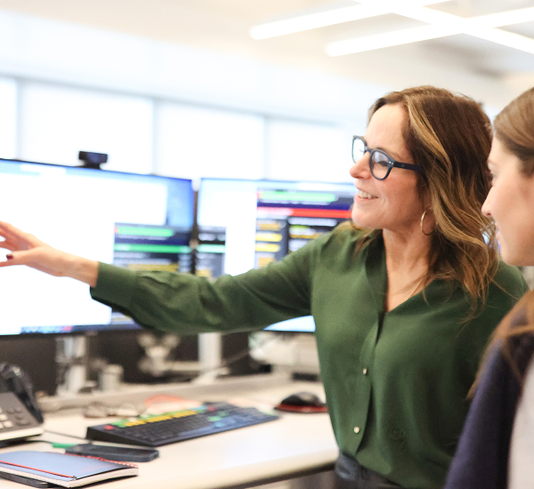 employees at computer monitor